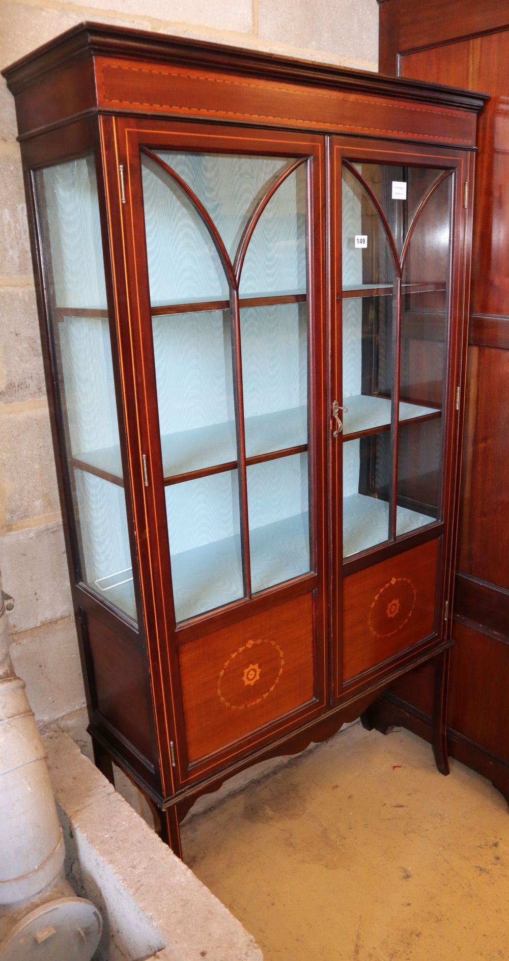 An Edwardian mahogany china display cabinet on cabriole legs, W.89cm